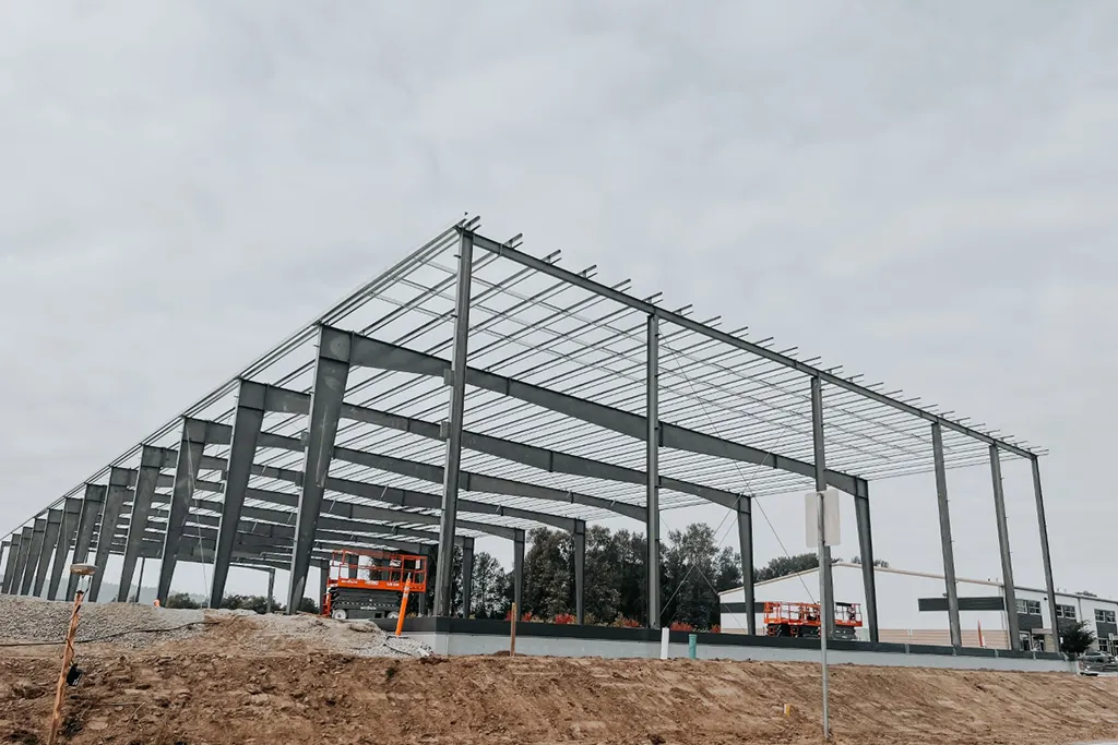Side profile of a massive structural steel warehouse frame erected by Westmore Construction’s expert ironworkers.