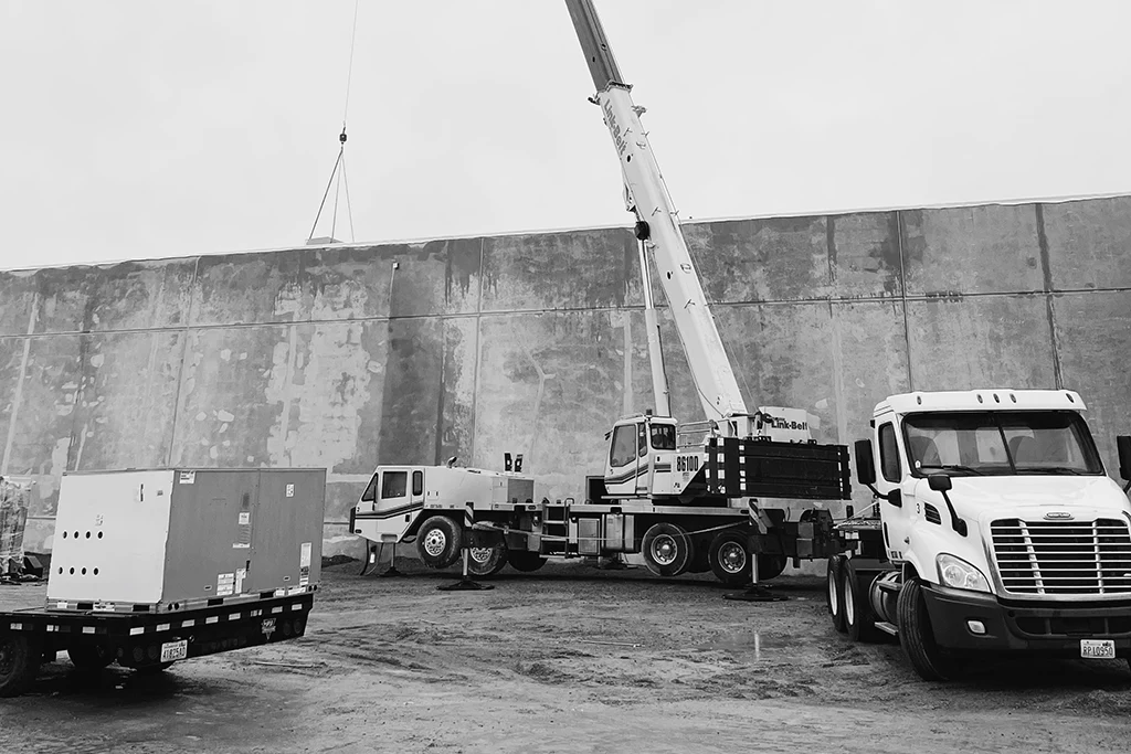 Westmore Construction commercial project management featuring a Link-Belt crane and heavy equipment on-site in Vancouver, WA