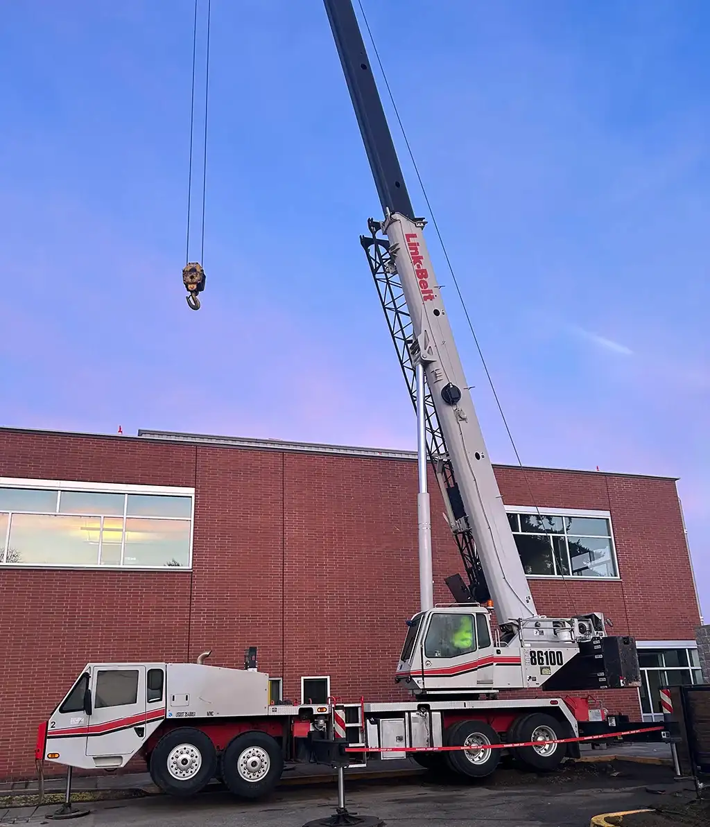 Westmore Construction Link-Belt crane and transport equipment at a major industrial project site in the Portland-Vancouver metro area.