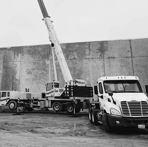 Westmore Construction commercial project management featuring a Link-Belt crane and heavy equipment on-site in Vancouver, WA