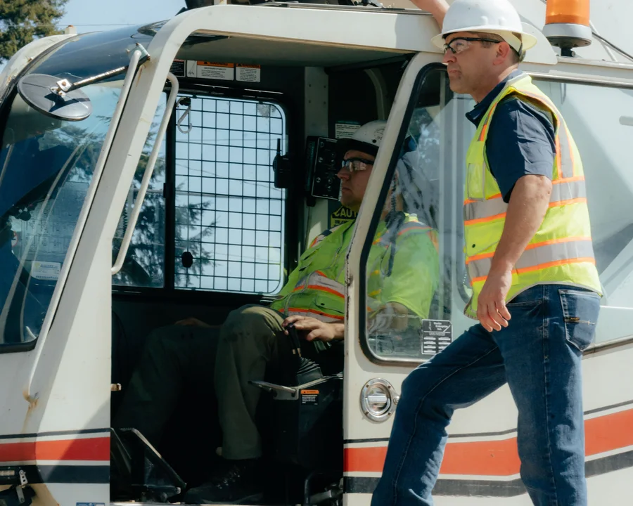 Westmore crew in hi-vis gear at the crane cab
